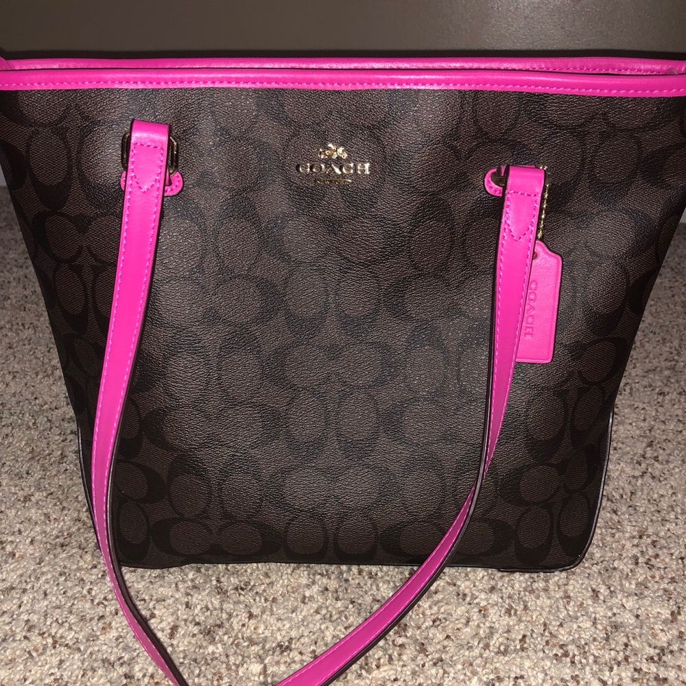 Dark brown and neon pink coach purse